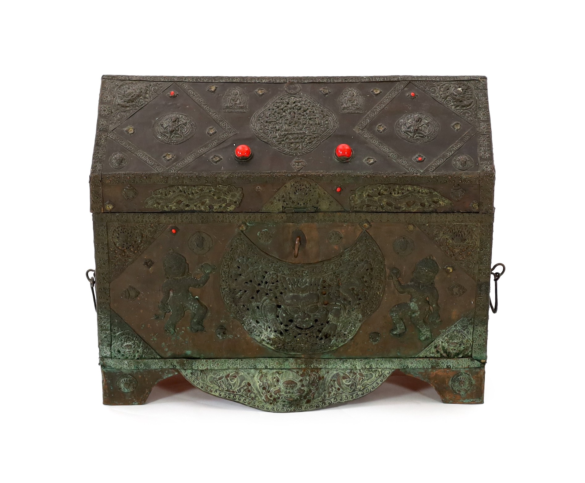 A Tibetan copper repousse-work casket, 20th century, 65cm wide, 49.5cm